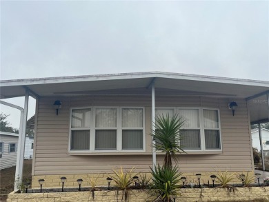 Priced for a quick sale. This well kept home is Located in the on High Point Golf Club, Inc. in Florida - for sale on GolfHomes.com, golf home, golf lot