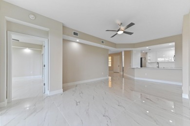 Introducing a sophisticatedly updated residence at 12454 Crystal on Westchester Golf and Country Club in Florida - for sale on GolfHomes.com, golf home, golf lot
