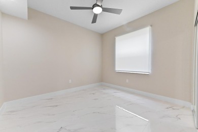 Introducing a sophisticatedly updated residence at 12454 Crystal on Westchester Golf and Country Club in Florida - for sale on GolfHomes.com, golf home, golf lot
