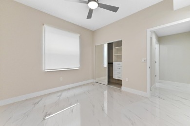 Introducing a sophisticatedly updated residence at 12454 Crystal on Westchester Golf and Country Club in Florida - for sale on GolfHomes.com, golf home, golf lot