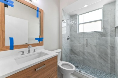 Introducing a sophisticatedly updated residence at 12454 Crystal on Westchester Golf and Country Club in Florida - for sale on GolfHomes.com, golf home, golf lot