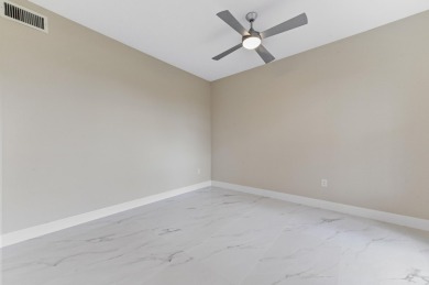 Introducing a sophisticatedly updated residence at 12454 Crystal on Westchester Golf and Country Club in Florida - for sale on GolfHomes.com, golf home, golf lot