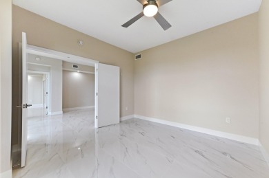 Introducing a sophisticatedly updated residence at 12454 Crystal on Westchester Golf and Country Club in Florida - for sale on GolfHomes.com, golf home, golf lot
