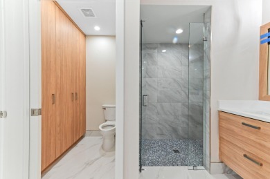 Introducing a sophisticatedly updated residence at 12454 Crystal on Westchester Golf and Country Club in Florida - for sale on GolfHomes.com, golf home, golf lot
