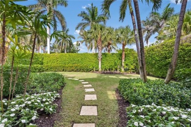 In the heart of the Moorings sits a picture-perfect single story on The Moorings Country Club in Florida - for sale on GolfHomes.com, golf home, golf lot