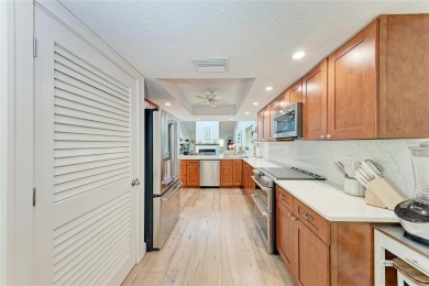 Absolutely Stunning Country Club Villa! Roofs replaced. The on IMG Academies Golf and Country Club in Florida - for sale on GolfHomes.com, golf home, golf lot