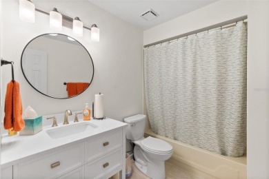 This 3 bedroom, 2 bath, GOLF course, fully furnished home is a on The Grand Club - Pine Lakes Course in Florida - for sale on GolfHomes.com, golf home, golf lot