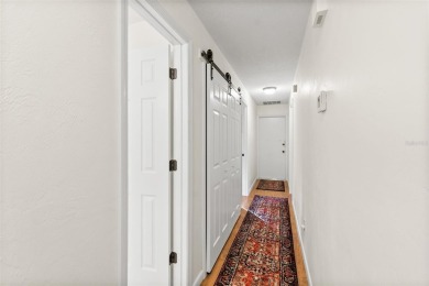 This 3 bedroom, 2 bath, GOLF course, fully furnished home is a on The Grand Club - Pine Lakes Course in Florida - for sale on GolfHomes.com, golf home, golf lot