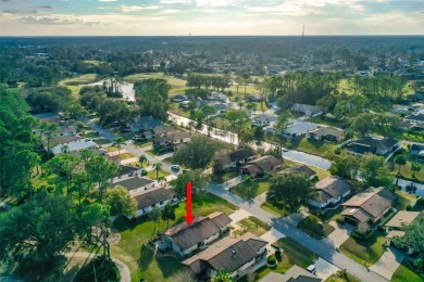 This 3 bedroom, 2 bath, GOLF course, fully furnished home is a on The Grand Club - Pine Lakes Course in Florida - for sale on GolfHomes.com, golf home, golf lot