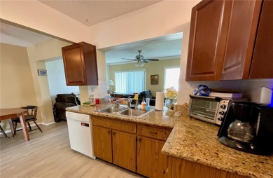 This home has  2-bedrooms, 2-bathrooms, 1,129 square feet and a on Mainlands Golf Club in Florida - for sale on GolfHomes.com, golf home, golf lot