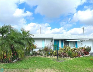 REDUCED!  Lovely Leisureville home.  This 2BR/1BA w/1CG home has on Leisureville Community Association in Florida - for sale on GolfHomes.com, golf home, golf lot