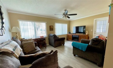 This home has  2-bedrooms, 2-bathrooms, 1,129 square feet and a on Mainlands Golf Club in Florida - for sale on GolfHomes.com, golf home, golf lot
