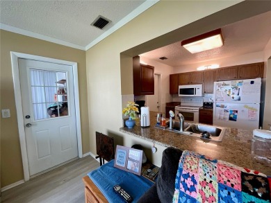 This home has  2-bedrooms, 2-bathrooms, 1,129 square feet and a on Mainlands Golf Club in Florida - for sale on GolfHomes.com, golf home, golf lot