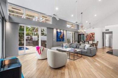 Stunning 3BR/2.5BA lakefront pool home in Newport Bay Club! This on St. Andrews Country Club of Boca Raton in Florida - for sale on GolfHomes.com, golf home, golf lot