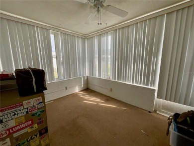 This home has  2-bedrooms, 2-bathrooms, 1,129 square feet and a on Mainlands Golf Club in Florida - for sale on GolfHomes.com, golf home, golf lot