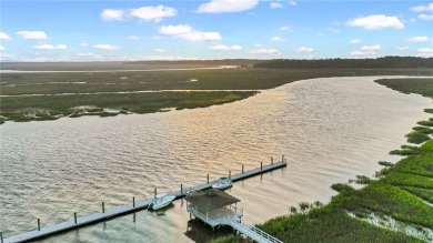 Cooper's Point provides access to a community deep water dock on Sapelo Hammock Golf Club in Georgia - for sale on GolfHomes.com, golf home, golf lot