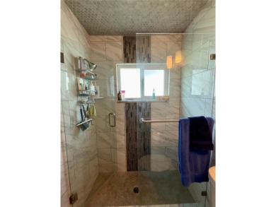 This home has  2-bedrooms, 2-bathrooms, 1,129 square feet and a on Mainlands Golf Club in Florida - for sale on GolfHomes.com, golf home, golf lot