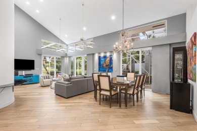 Stunning 3BR/2.5BA lakefront pool home in Newport Bay Club! This on St. Andrews Country Club of Boca Raton in Florida - for sale on GolfHomes.com, golf home, golf lot