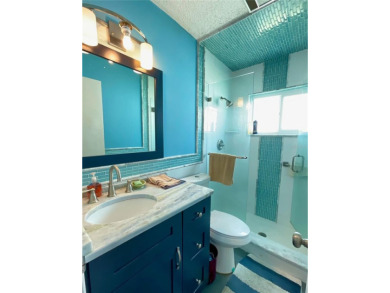 This home has  2-bedrooms, 2-bathrooms, 1,129 square feet and a on Mainlands Golf Club in Florida - for sale on GolfHomes.com, golf home, golf lot