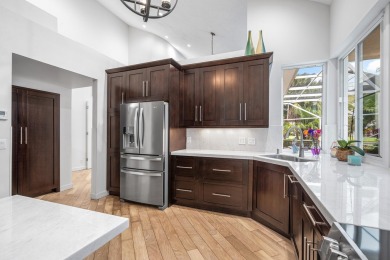 Stunning 3BR/2.5BA lakefront pool home in Newport Bay Club! This on St. Andrews Country Club of Boca Raton in Florida - for sale on GolfHomes.com, golf home, golf lot