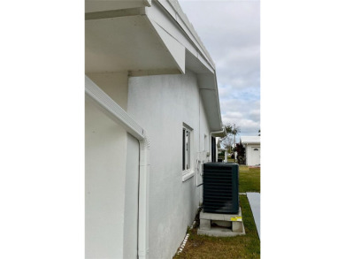 This home has  2-bedrooms, 2-bathrooms, 1,129 square feet and a on Mainlands Golf Club in Florida - for sale on GolfHomes.com, golf home, golf lot