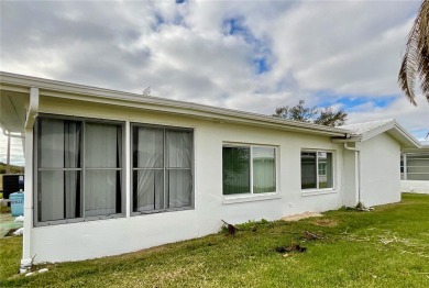 This home has  2-bedrooms, 2-bathrooms, 1,129 square feet and a on Mainlands Golf Club in Florida - for sale on GolfHomes.com, golf home, golf lot