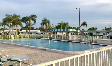 This home has  2-bedrooms, 2-bathrooms, 1,129 square feet and a on Mainlands Golf Club in Florida - for sale on GolfHomes.com, golf home, golf lot