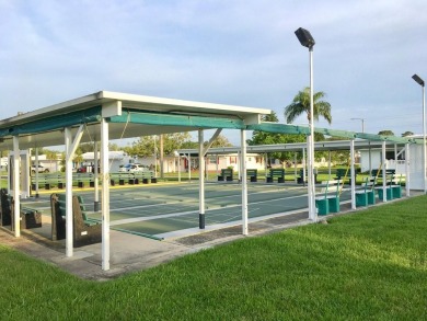 This home has  2-bedrooms, 2-bathrooms, 1,129 square feet and a on Mainlands Golf Club in Florida - for sale on GolfHomes.com, golf home, golf lot