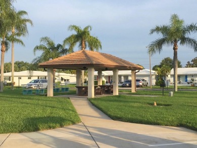 This home has  2-bedrooms, 2-bathrooms, 1,129 square feet and a on Mainlands Golf Club in Florida - for sale on GolfHomes.com, golf home, golf lot