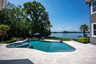 Impeccable craftsmanship and 305' of pristine shoreline define on Trump National Golf Club Charlotte in North Carolina - for sale on GolfHomes.com, golf home, golf lot