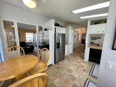 This home comes complete and with a Golf Cart!! Just bring your on Water Oak Country Club Estates in Florida - for sale on GolfHomes.com, golf home, golf lot