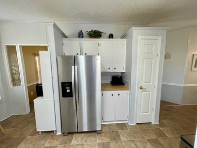 This home comes complete and with a Golf Cart!! Just bring your on Water Oak Country Club Estates in Florida - for sale on GolfHomes.com, golf home, golf lot