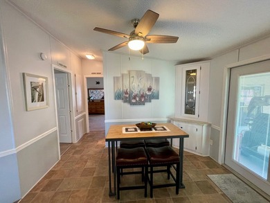 This home comes complete and with a Golf Cart!! Just bring your on Water Oak Country Club Estates in Florida - for sale on GolfHomes.com, golf home, golf lot