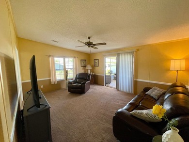 This home comes complete and with a Golf Cart!! Just bring your on Water Oak Country Club Estates in Florida - for sale on GolfHomes.com, golf home, golf lot