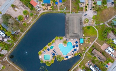 Prime Location RV Lot in Exclusive Clothing-Optional Community - on The Groves Golf and Country Club in Florida - for sale on GolfHomes.com, golf home, golf lot
