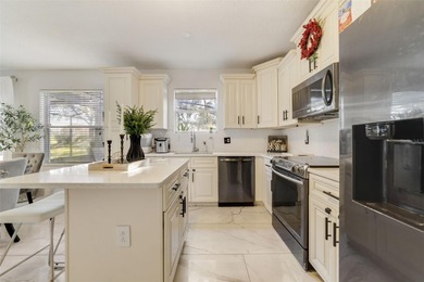 A welcoming blend of style, expertly designed space, and peace on Stoneybrook East Golf Club in Florida - for sale on GolfHomes.com, golf home, golf lot