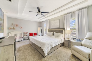 A welcoming blend of style, expertly designed space, and peace on Stoneybrook East Golf Club in Florida - for sale on GolfHomes.com, golf home, golf lot