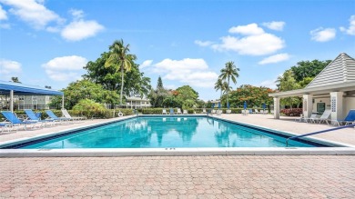 Beautifully redesigned 2-bedroom, 2-bathroom first-floor unit on Wynmoor Golf Course in Florida - for sale on GolfHomes.com, golf home, golf lot