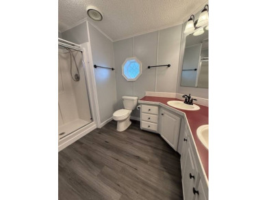 Big and Beautiful updated home on the 10th fairway of The on Hamptons Golf Club in Florida - for sale on GolfHomes.com, golf home, golf lot