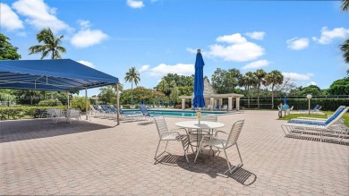 Beautifully redesigned 2-bedroom, 2-bathroom first-floor unit on Wynmoor Golf Course in Florida - for sale on GolfHomes.com, golf home, golf lot