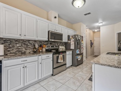 Welcome to this beautifully maintained 3-bedroom, 2-bathroom on Wildwood Country Club in Florida - for sale on GolfHomes.com, golf home, golf lot