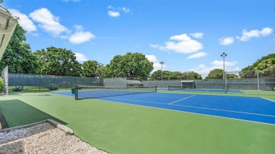 Beautifully redesigned 2-bedroom, 2-bathroom first-floor unit on Wynmoor Golf Course in Florida - for sale on GolfHomes.com, golf home, golf lot