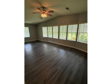 Big and Beautiful updated home on the 10th fairway of The on Hamptons Golf Club in Florida - for sale on GolfHomes.com, golf home, golf lot