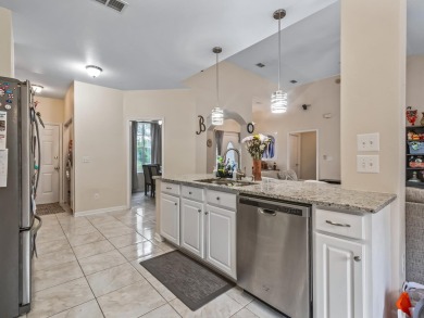 Welcome to this beautifully maintained 3-bedroom, 2-bathroom on Wildwood Country Club in Florida - for sale on GolfHomes.com, golf home, golf lot