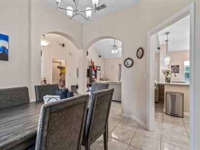 Welcome to this beautifully maintained 3-bedroom, 2-bathroom on Wildwood Country Club in Florida - for sale on GolfHomes.com, golf home, golf lot
