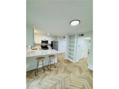 102 Adrian Place is a rare, walk-up townhome opportunity sited on Cross Creek Golf Course in Georgia - for sale on GolfHomes.com, golf home, golf lot