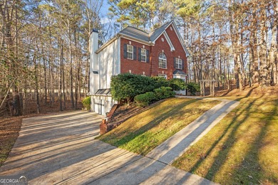 This spacious four-bedroom residence sits on an impressive on Fairfield Plantation Golf and Country Club in Georgia - for sale on GolfHomes.com, golf home, golf lot