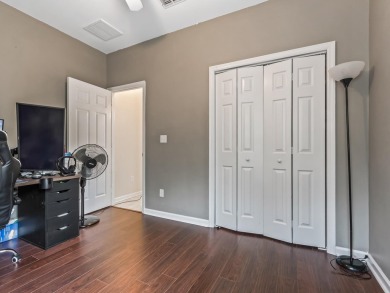 Welcome to this beautifully maintained 3-bedroom, 2-bathroom on Wildwood Country Club in Florida - for sale on GolfHomes.com, golf home, golf lot
