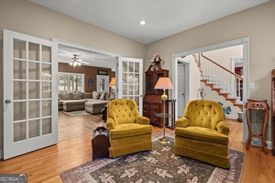 This spacious four-bedroom residence sits on an impressive on Fairfield Plantation Golf and Country Club in Georgia - for sale on GolfHomes.com, golf home, golf lot