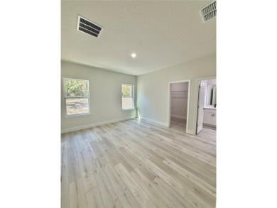 One or more photo(s) has been virtually staged. SPACIOUS NEW on Citrus Springs Country Club in Florida - for sale on GolfHomes.com, golf home, golf lot